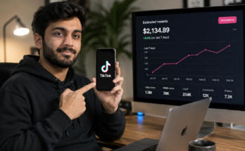 Realistic content creator holding a smartphone with the TikTok app while displaying monetization analytics and earnings dashboard in a modern workspace, illustrating TikTok Monetization for Beginners.