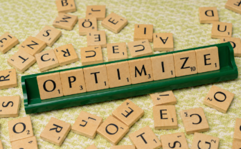 Optimize Your FIVERR Gig – wooden letter tiles spelling Optimize for Fiverr gig optimization.