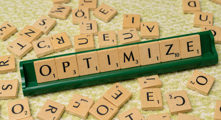 Optimize Your FIVERR Gig – wooden letter tiles spelling Optimize for Fiverr gig optimization.